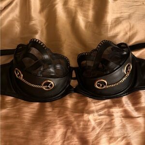 Black faux leather bra with chains